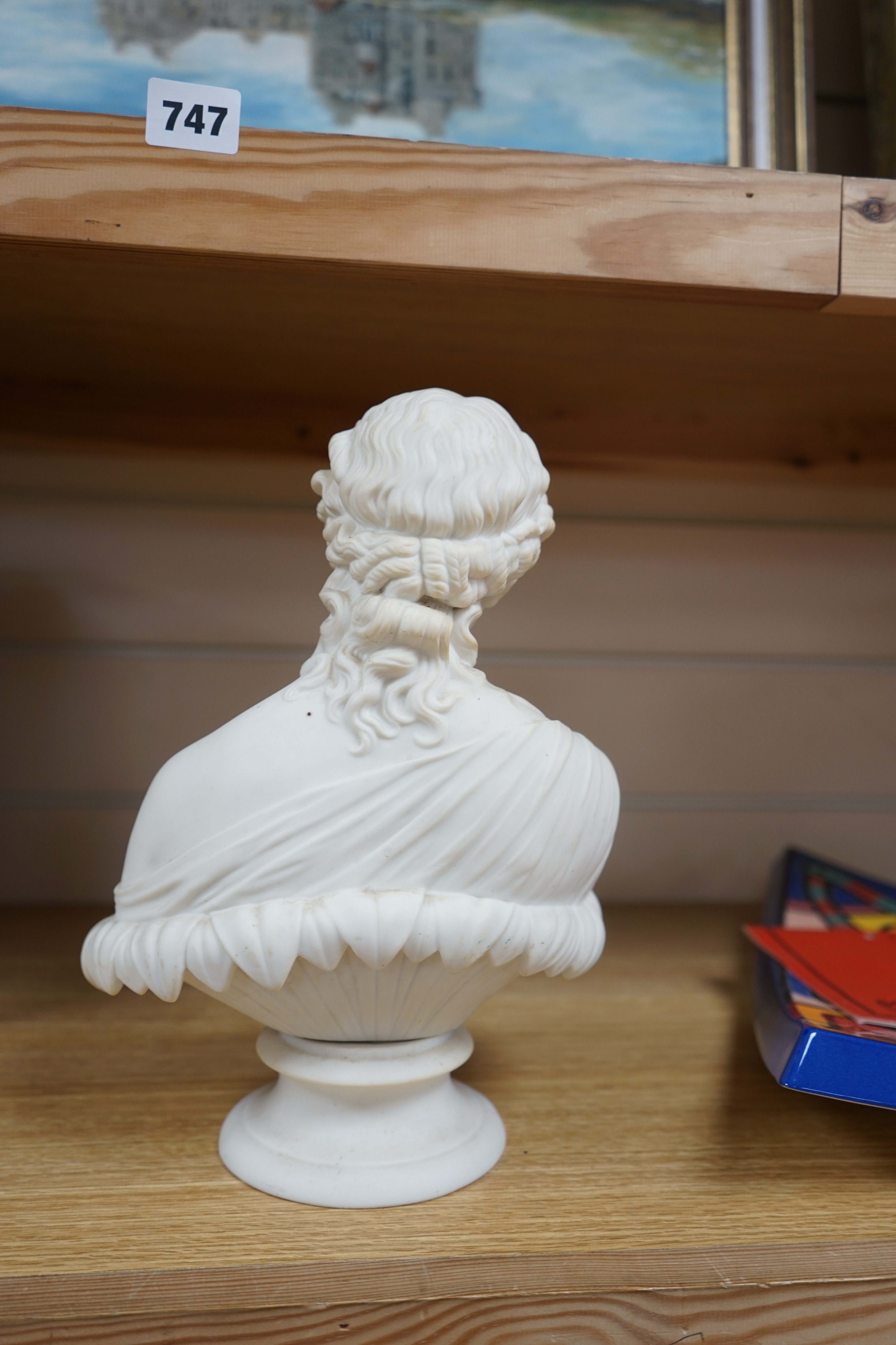 A Parianware bust of Clytie, 28cm high. Condition - good